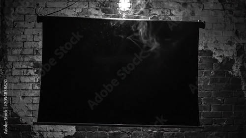 Black Backdrop Reveal of Colorful Smoke Explosion Against a Brick Wall Background in Dramatic Lighting