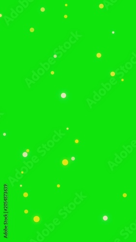 Floating Yellow and White Bokeh Particles on Green Screen Background