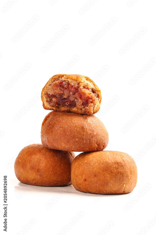 Fototapeta premium Handmade Yunnan Xuanwei Autumn Pastries with Red Filling Stack