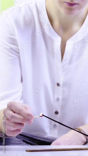 Meditation symbol of lighting up incense