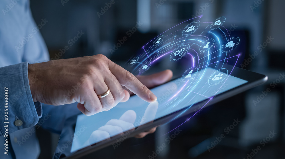 Fototapeta premium HR manager using digital tablet to analyze connected human resources data structure.