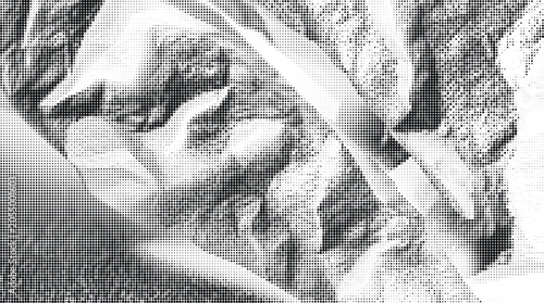 A dramatic grayscale illustration of a mountain landscape with rugged terrain.