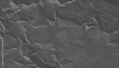 Foto Close-up view of a gray crumpled paper texture on a flat surface