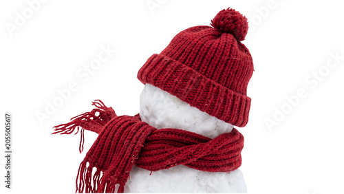 Foto Snowman head with red knit hat and scarf on transparent background