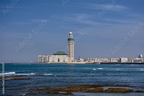 Bild auf Leinwand Exterior view of the majestic Hassan II Mosque built on the Atlantic Ocean in Ca