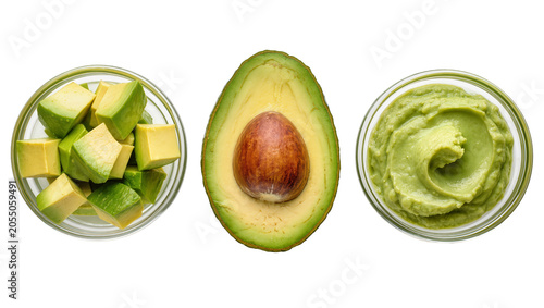 Cuadro en lienzo Isolated fresh avocado sliced, diced, and mashed in bowls for healthy food prepa