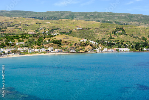 Andros Neimporio beach with shallow and crystal waters. Chora. Andros island, Cyclades, Greece