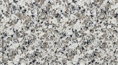 Polished grey and white granite texture background, high-resolution natural stone surface with black speckled mineral patterns for kitchen countertop, flooring tile, interior design backdrop.