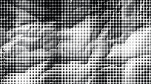 Schilderij op canvas Aerial view of a vast landscape with rugged terrain and natural formations