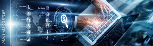 Fotografia Financial professional using a laptop to audit company compliance records