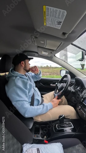 Man driving car profile view