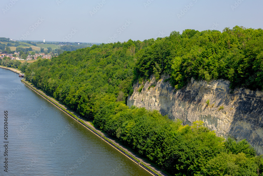 Fototapeta premium The Albert Canal in Lanaye and Kanne villages in Province de Liège, Walloon Region, Belgium, Border between Maastricht, Limburg, Netherlands, Canal connects also the Meuse river with the Scheldt river
