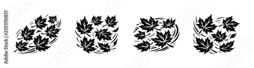 Quadro su tela Black maple leaves swirling in a stylized wind pattern, representing autumn's ar