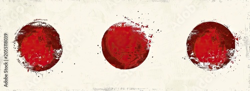 Three vibrant, circular red splashes are arranged across a light, textured off-white backdrop