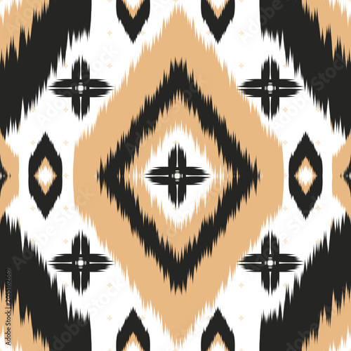 Seamless Pattern Oriental Ikat Design with Geometric Ethnic Motifs in Earth Tone Colors