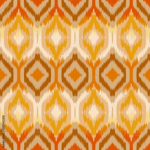 Seamless Geometric Ikat Background in Warm Earth Tones, Traditional Thai Textile Pattern -fabric texture background