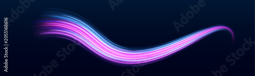 Fényképezés Electric blue and violet light ribbons twist into dynamic curves above a futuristic roadway