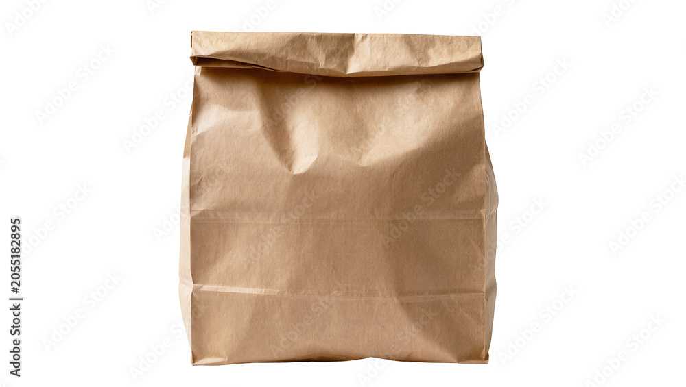 Naklejka premium Isolated brown paper bag with top edge folded and creased, natural eco-friendly packaging