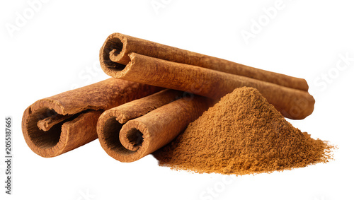Fotografie Isolated aromatic cinnamon sticks and natural ground spice powder, essential coo