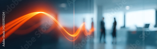 Abstract orange light trail in blurred office interior with silhouetted people, modern business background and motion blur