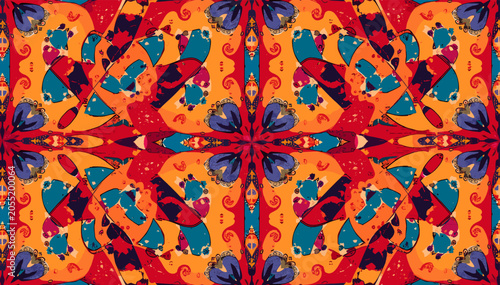 Fotografie Vibrant and intricate kaleidoscopic pattern with symmetrical abstract shapes in a rich palette of red, orange, teal, and yellow