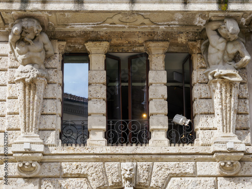Historic palace along piazza Cordusio in Milan, Italy