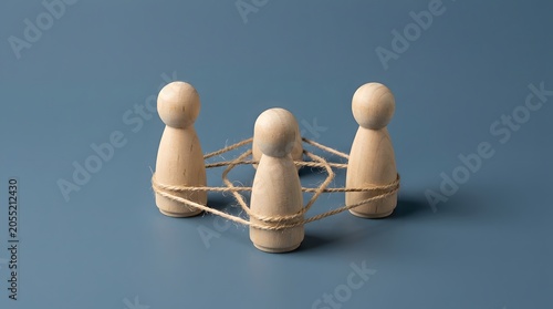 Wooden Peg Dolls Linked by Rope, Minimalist Studio Photography, Business Connectivity and Teamwork, Interconnected twine binding wooden figures
