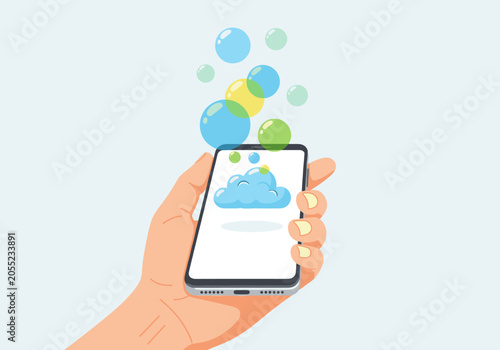 Hand holding smartphone syncing data to cloud computing service.