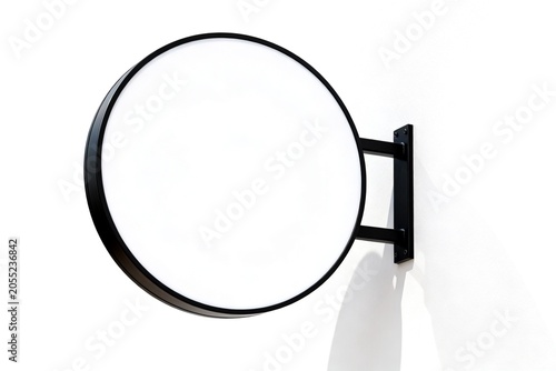 Modern Circular Signboard on White Wall