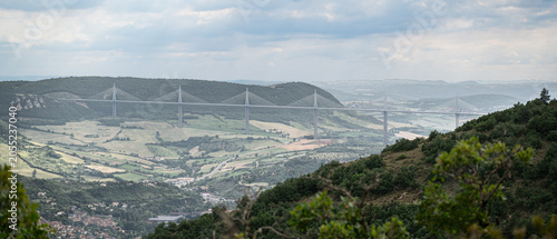 Millau Viaduct spanning the Tarn Valley in Aveyron, France. Elevated view of the famous cable stayed bridge crossing the landscape of southern France.