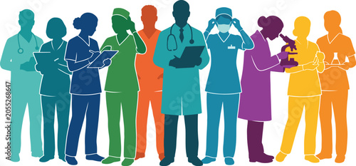 Medical professionals in various uniforms standing together in a hospital setting wearing colorful scrubs and lab coats.