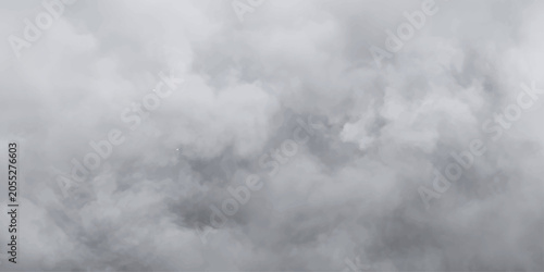 Foto Billowing Smoke Cloud: Dense, grey smoke or clouds fill the frame, suggesting industrial emissions, a natural phenomenon like fog, or a dramatic atmospheric effect