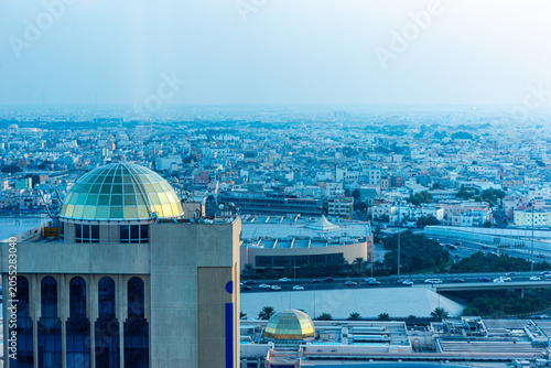 Panoramic Urban Landscape in Bahrain with Golden Dome Architecture