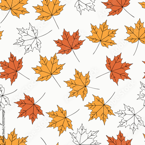 Seamless pattern of maple leaves in autumn colors, orange and yellow foliage on white, natural seasonal backdrop.