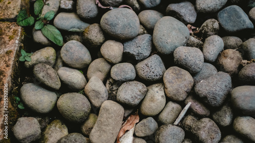 Pile of stones behind the house backyard