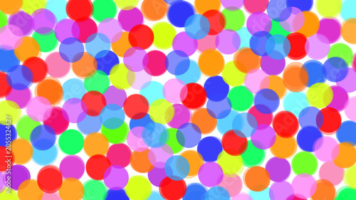 Vibrant multicolored polka dots on transparent background create festive pattern