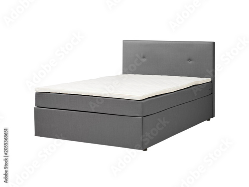 Classic double bed with big headboard isolated on white