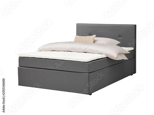 Classic double bed with big headboard isolated on white