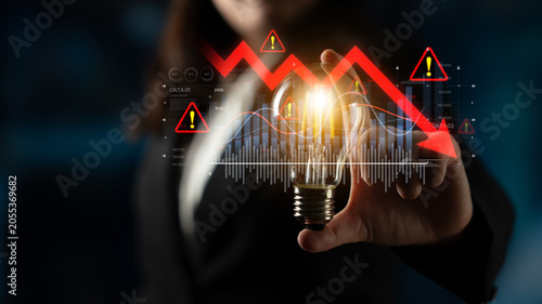 Fotografía Economic caution visualized with fluctuating market graph, alert symbols, and negative data trends