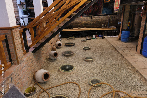 Wine cellar with wine production in clay containers called qvevri
