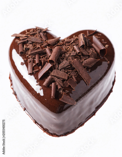 Chocolate Heart-Shaped Cake with White Icing and Chocolate Shavings