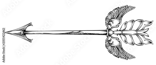 Fotografija an arrowhead with an ancient wing-shaped ornament