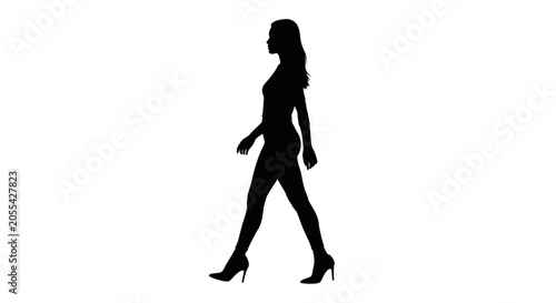 Photos A black silhouette of a woman walking in high heels against a white background