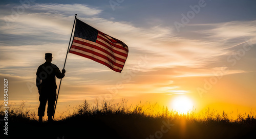 Man holding American flag at sunset on hilltop with golden light and patriotic mood
