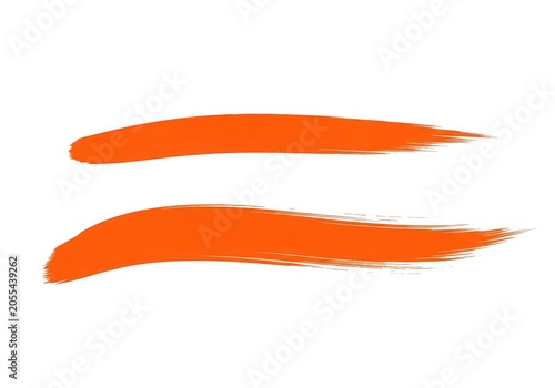 Two orange paint brush strokes on white background