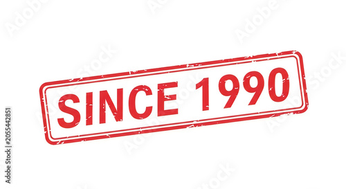 A stylized red ribbon announcing a company's establishment year, 1990, with bold serif typography and a classic banner design