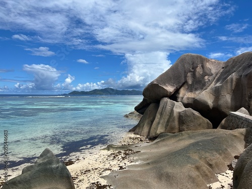 The beautiful Anse Source d'Argent beach on La Digue Island in the Seychelles. Turquoise sea, massive boulders, and white sand