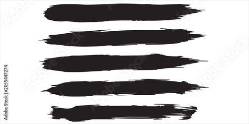 Five black brush strokes isolated on white background artistic texture