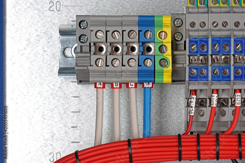 Connecting electrical modules using copper insulated electrical wires in the electrical switchboard. 