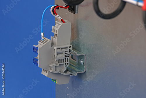 Connecting electrical modules using copper insulated electrical wires in the electrical switchboard. 